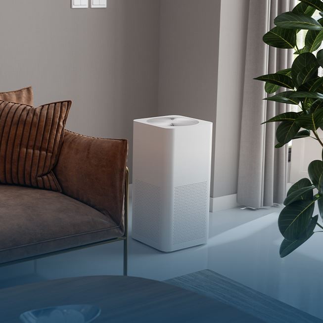A home air purifier in a comfortable living room