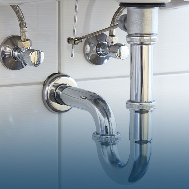 Clean plumbing fittings under a bathroom sink