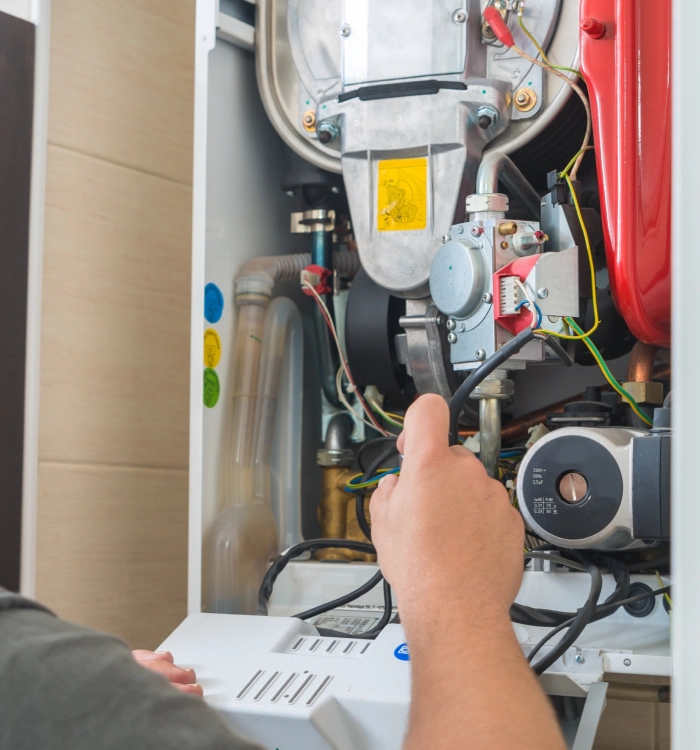 A technician diagnosing a heating system